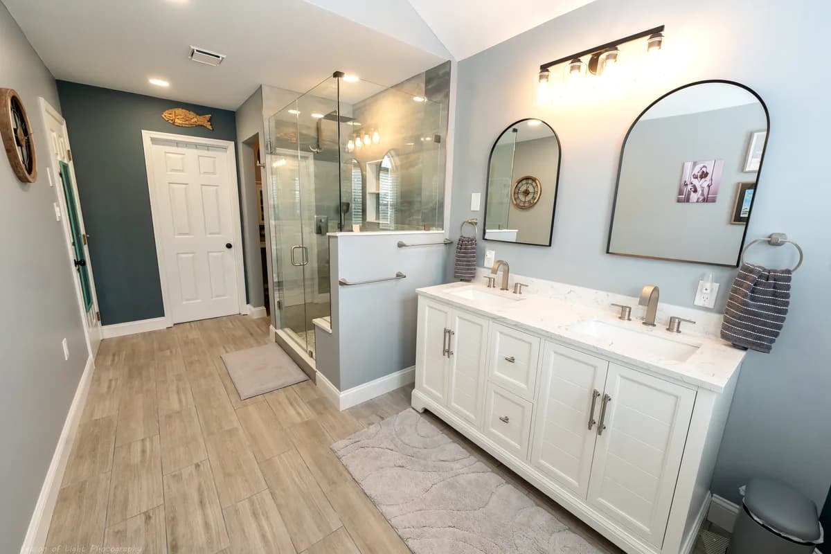 After — the renovated master bath down its long axis