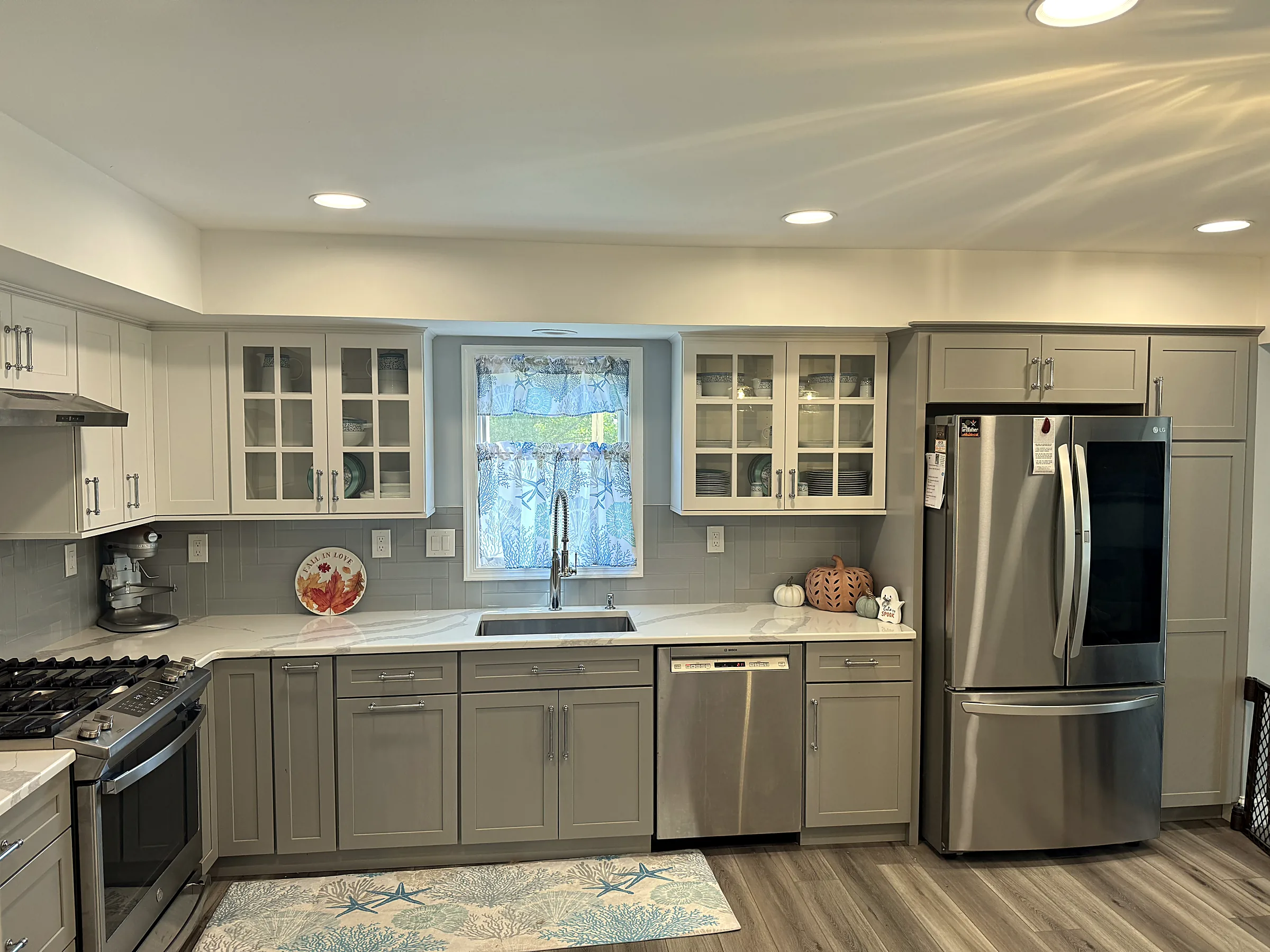 Completed 8:28 kitchen remodel with custom cabinetry and natural light
