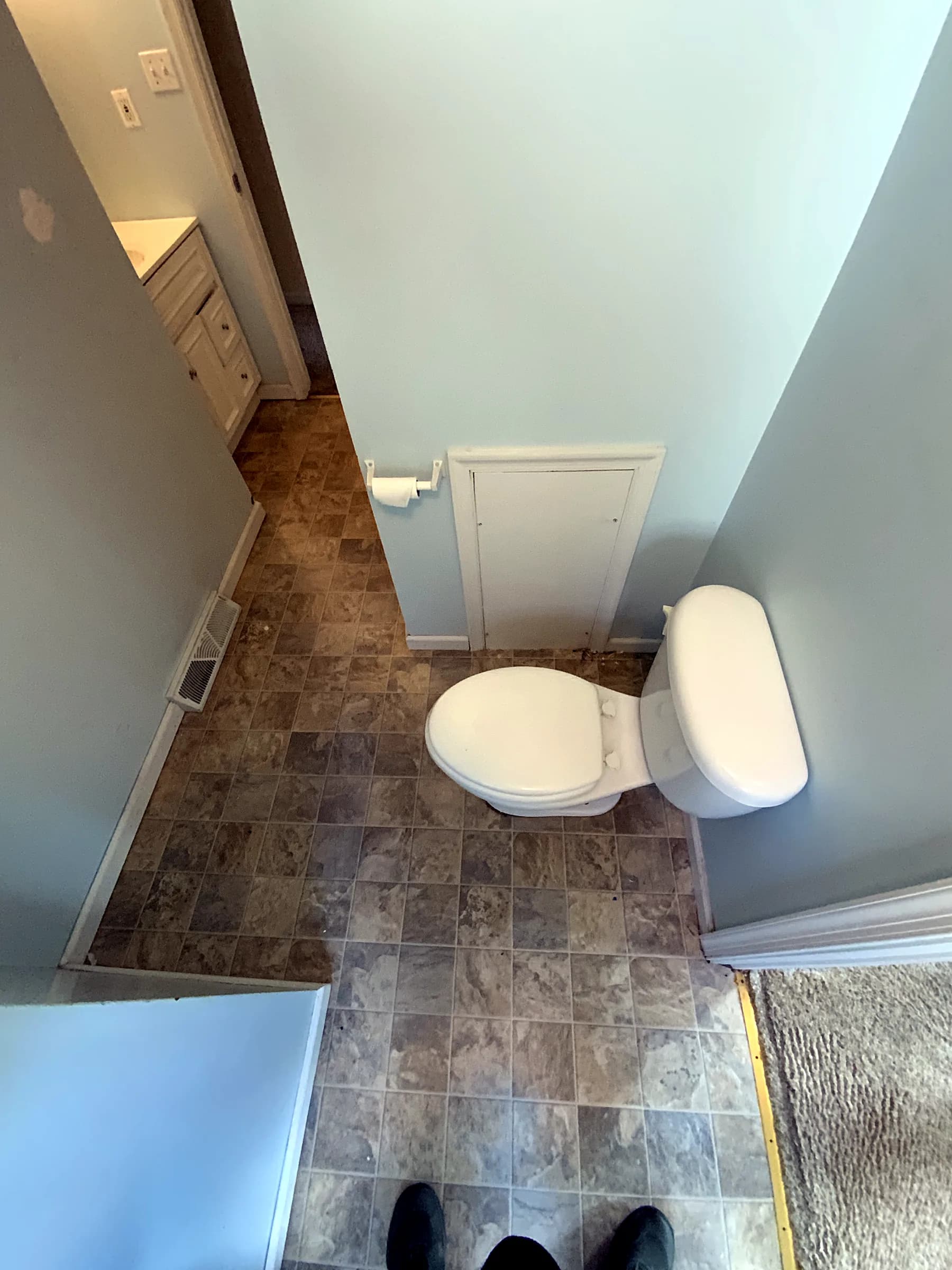 Bathroom reno: marble tub & navy vanity — before